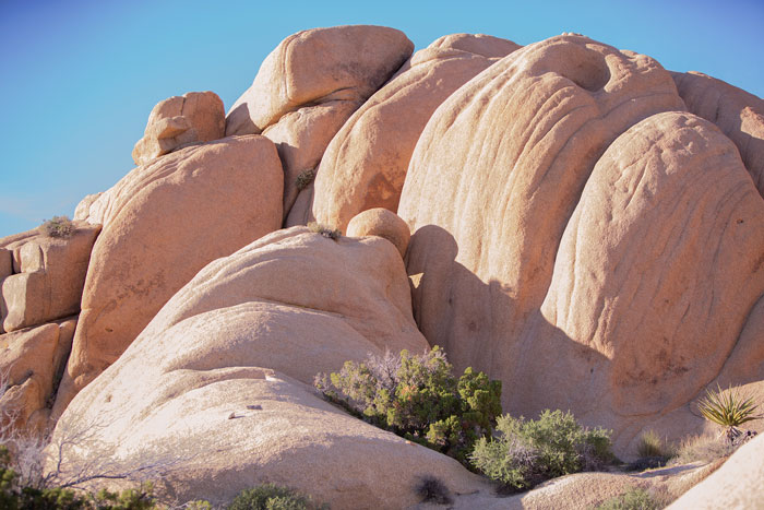 Sunlit boulders in a desert landscape
